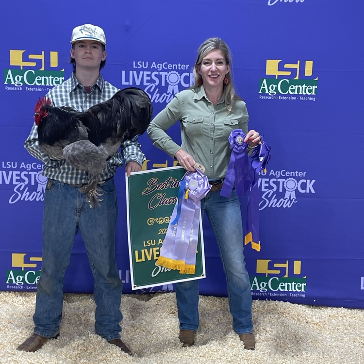 Andrew pictured with Blueberry and his mom  