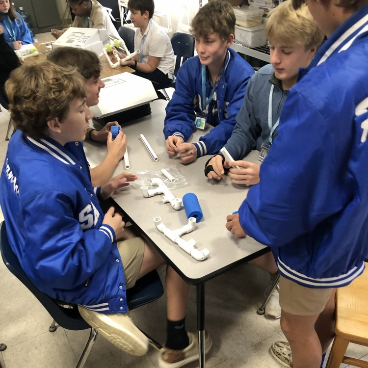 Students in Mr. Craig’s class work on underwater robots