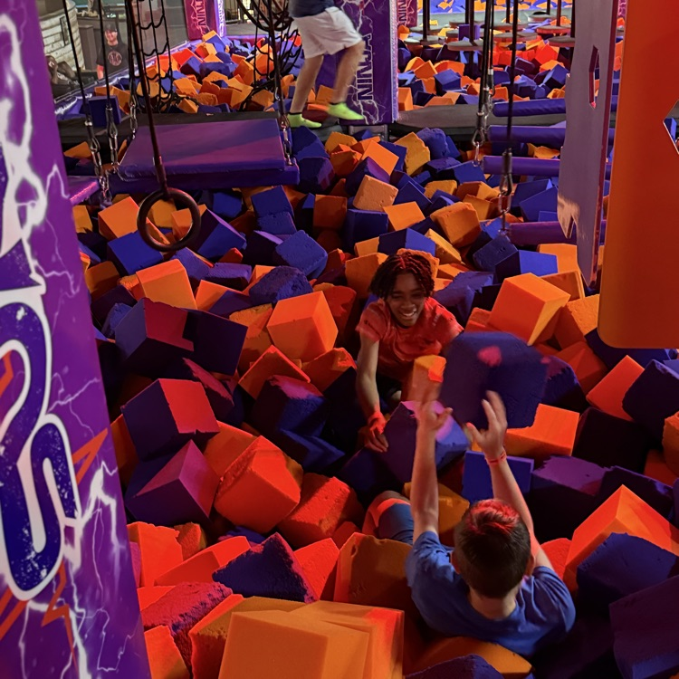 students in a foam pit