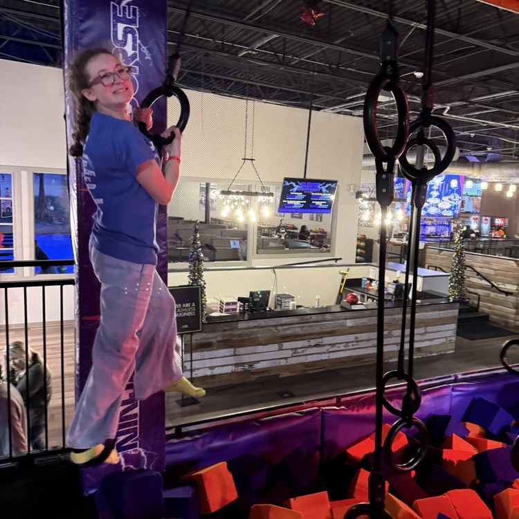 student on a zip line