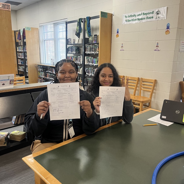 student show off their freshman year schedules