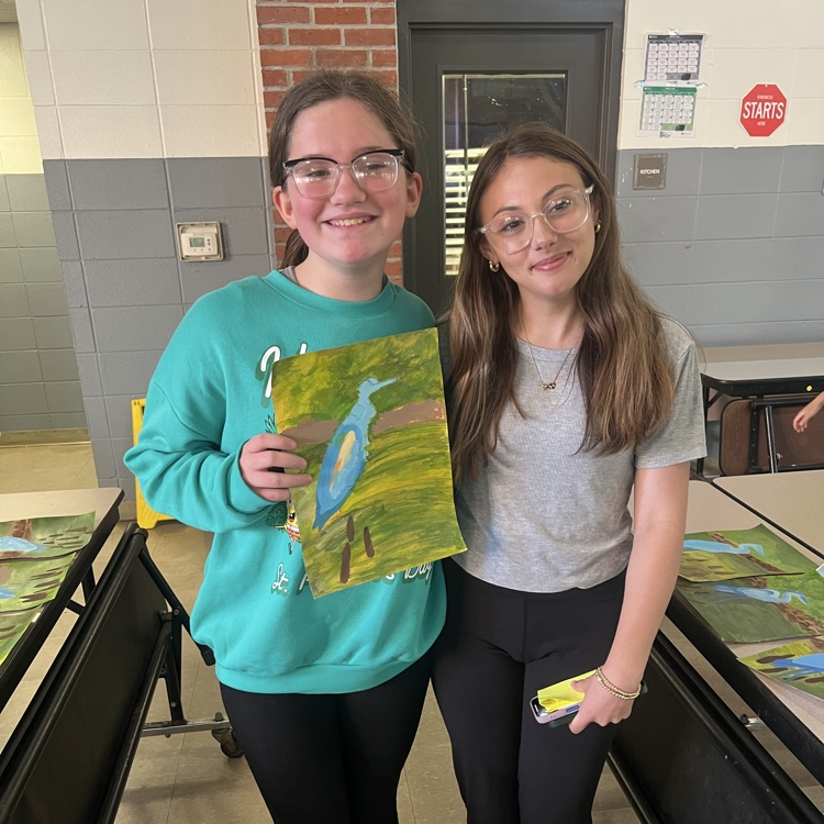 Student shows off her artwork  