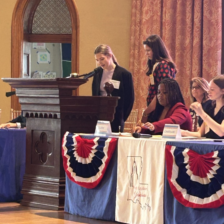 student speaking at podium
