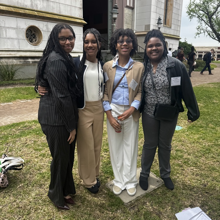 Students pictured in front of old state capitol
