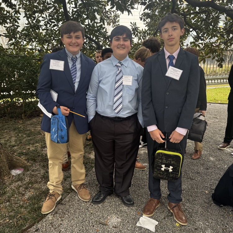 Students pictured in front of old state capitol