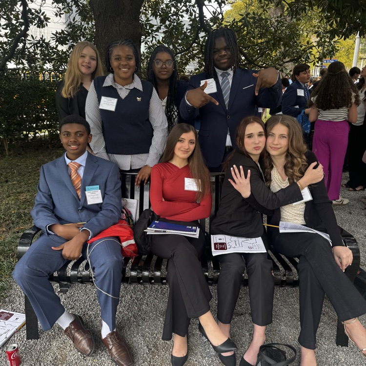 Students pictured in front of old state capitol