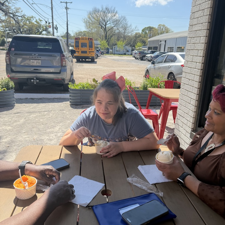 student and teacher enjoys an ice cream treat