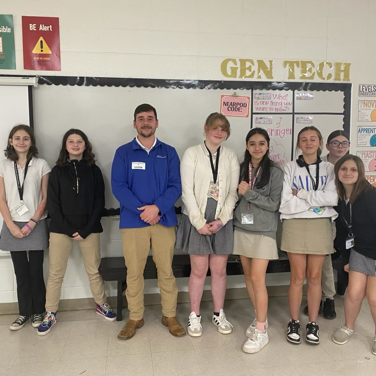 Mr. Ness pictured with class