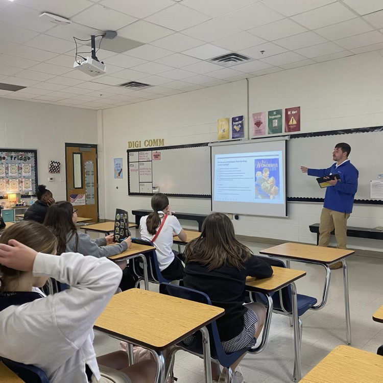 Mr. Ness speaks to class