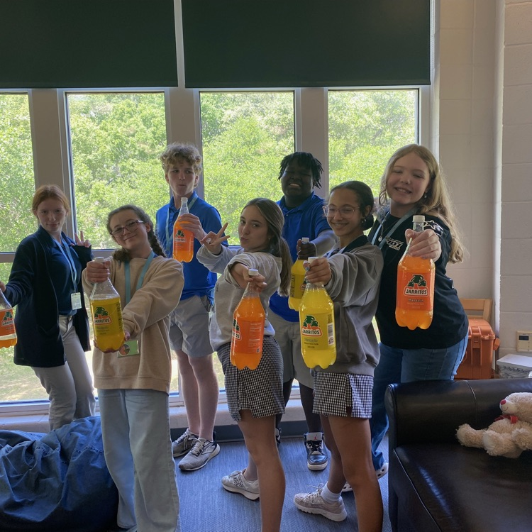 Club Read members show off cold drinks 