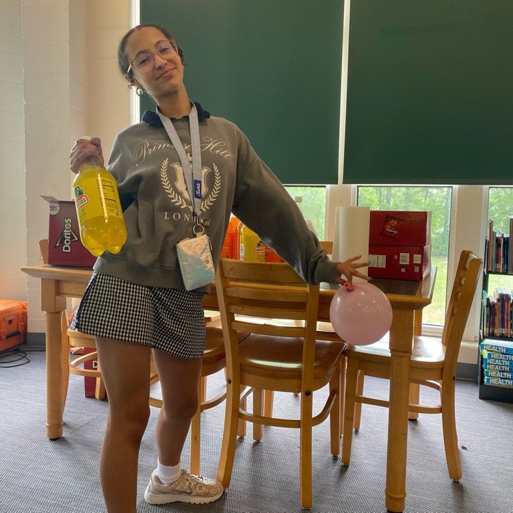 Jordyn plays a game at Club Read meeting 