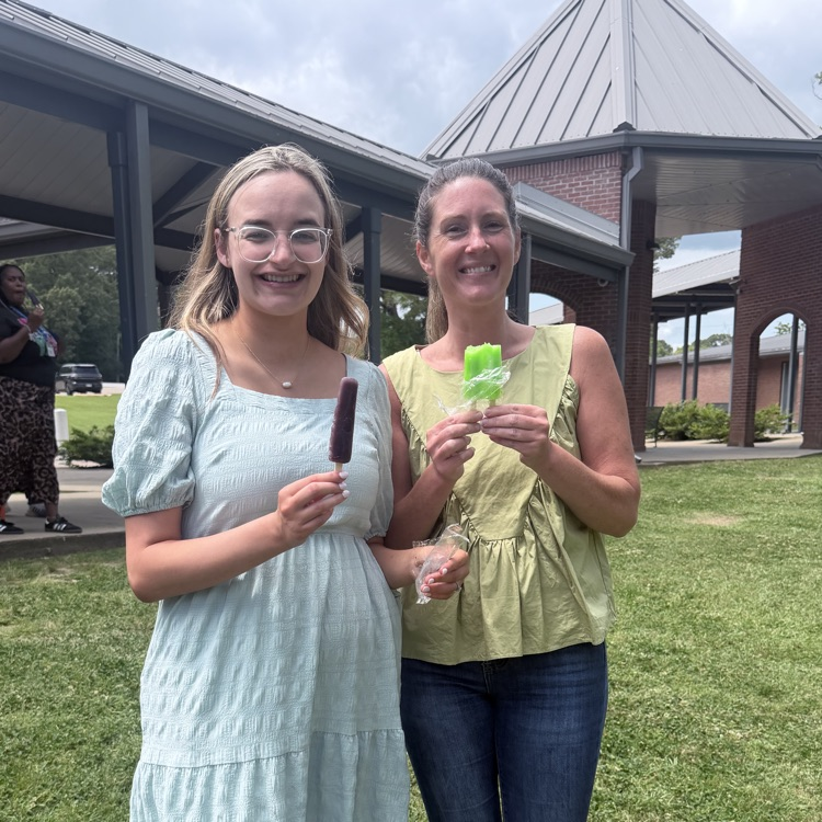 students enjoy a cool treat at recess