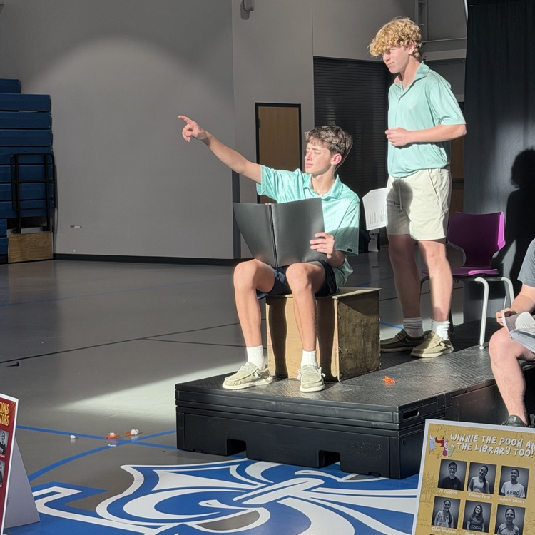 students featured on stage