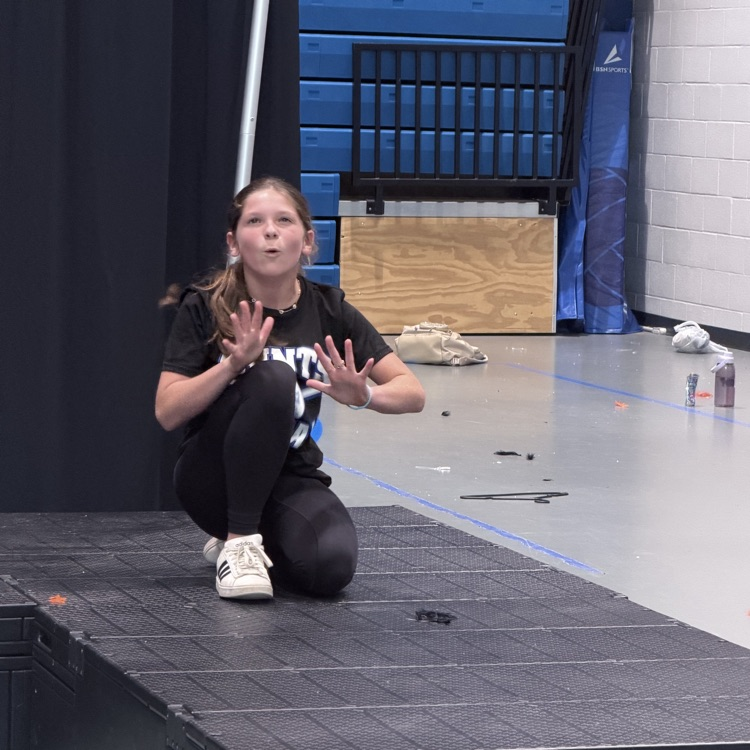 students featured on stage