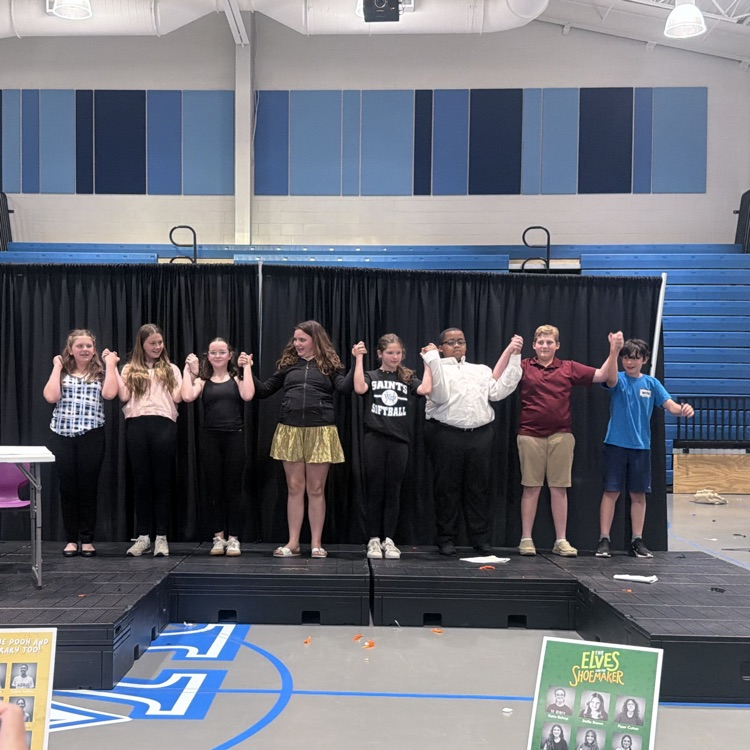 students featured on stage