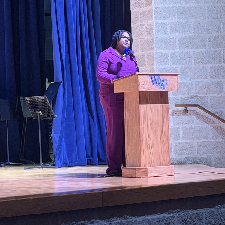 student speaks at podium 