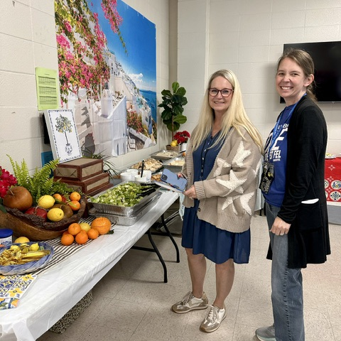 staff enjoy a meal