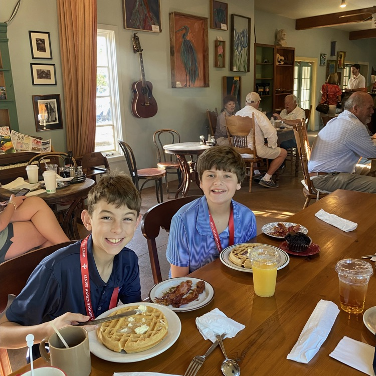 Students enjoy breakfast at the Birdman Cafe