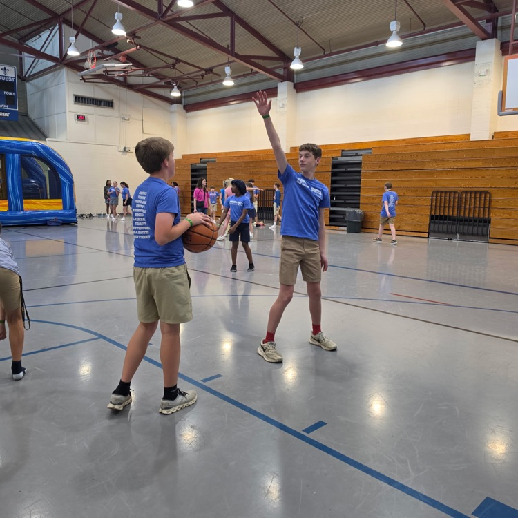 students play basketball