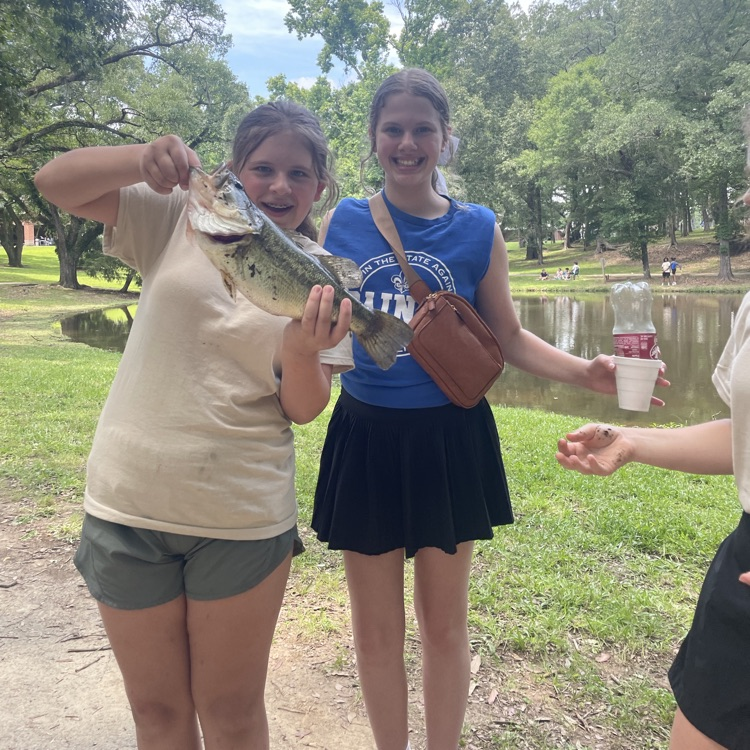 student catches a fish