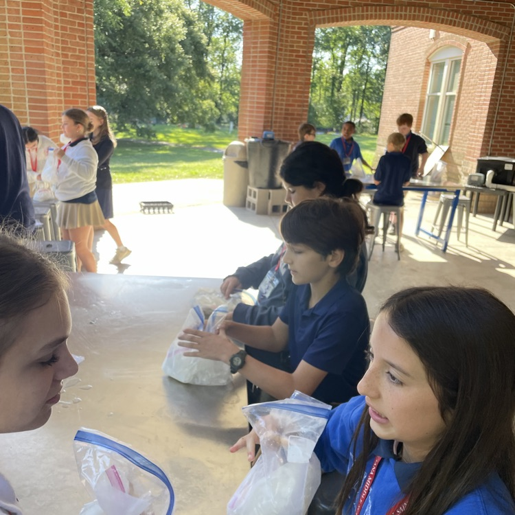 students make ice cream in science class