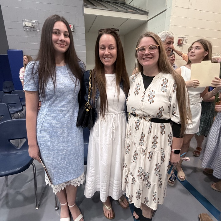 students celebrate with family