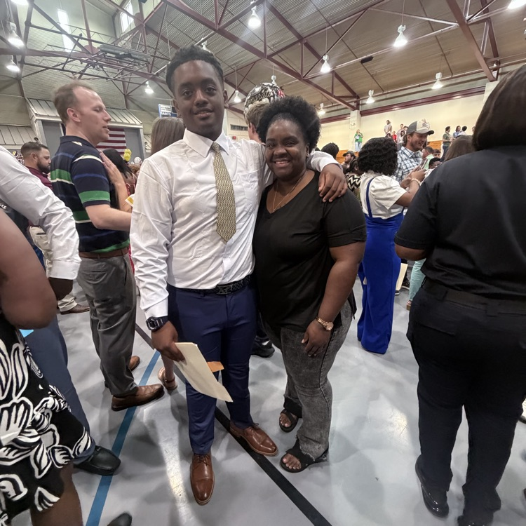 students celebrate with family