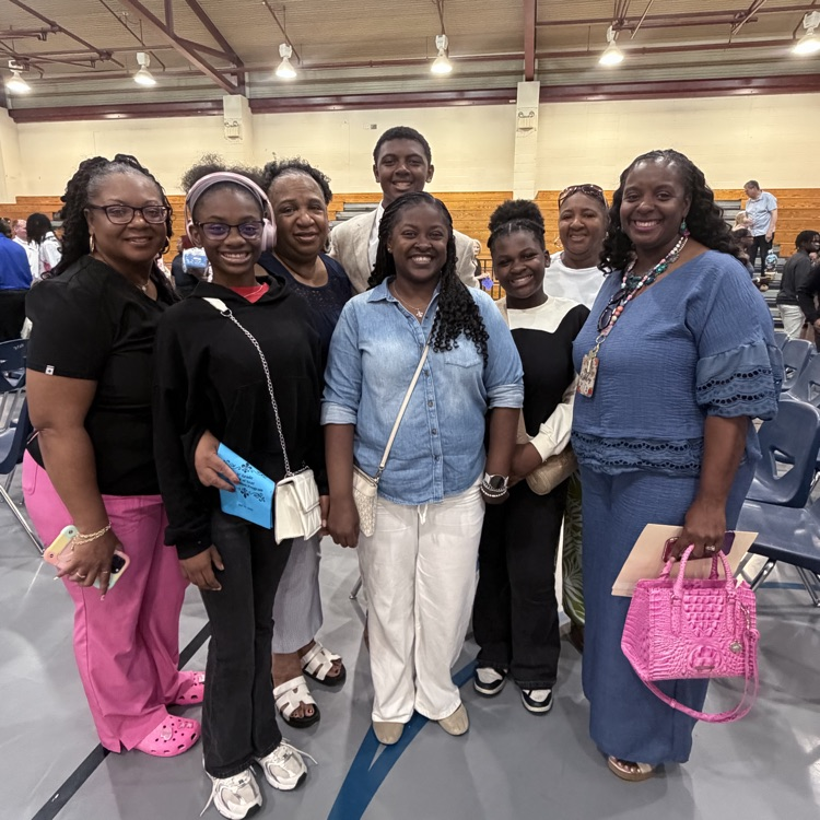 students celebrate with family