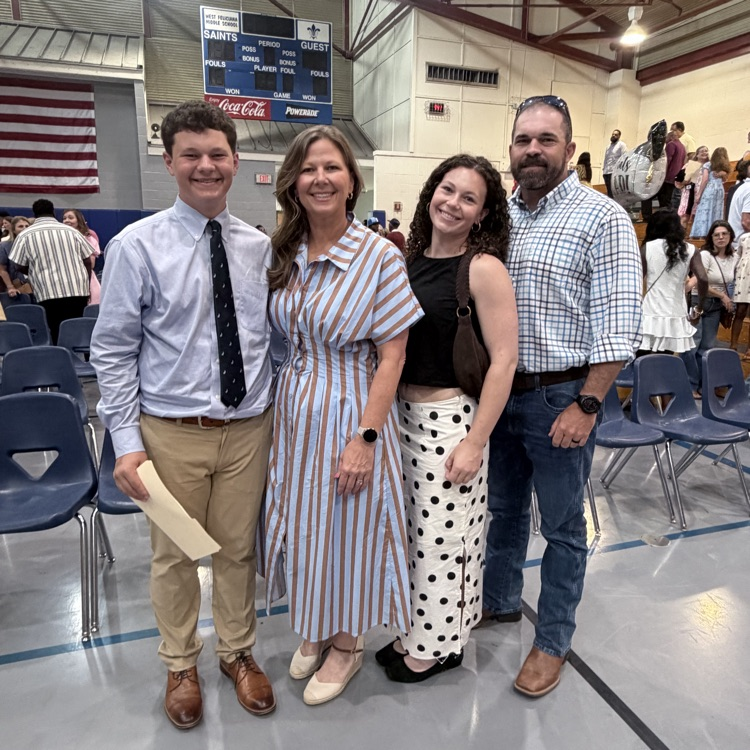 students celebrate with family