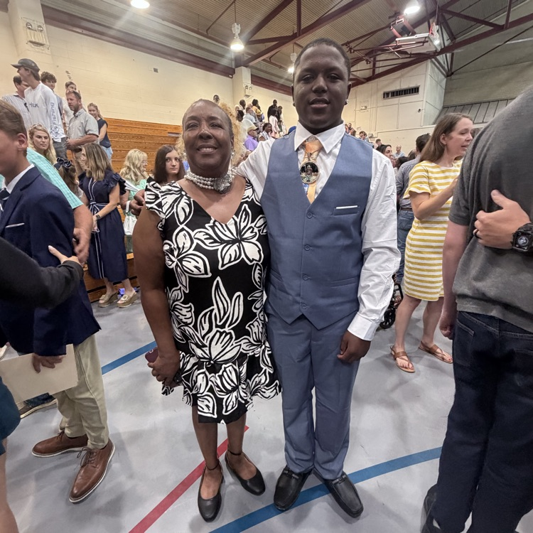 students celebrate with family