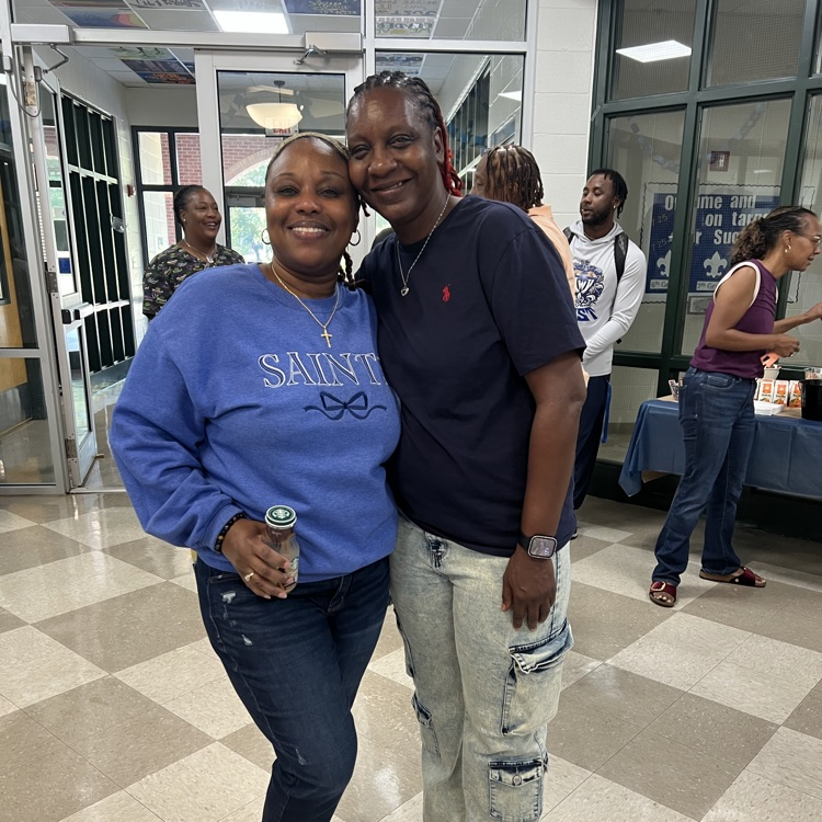 Staff members visit over breakfast