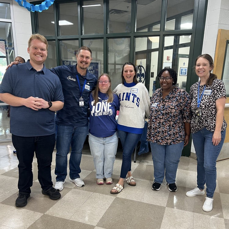 Staff members visit over breakfast