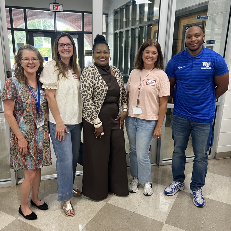 Staff members visit over breakfast