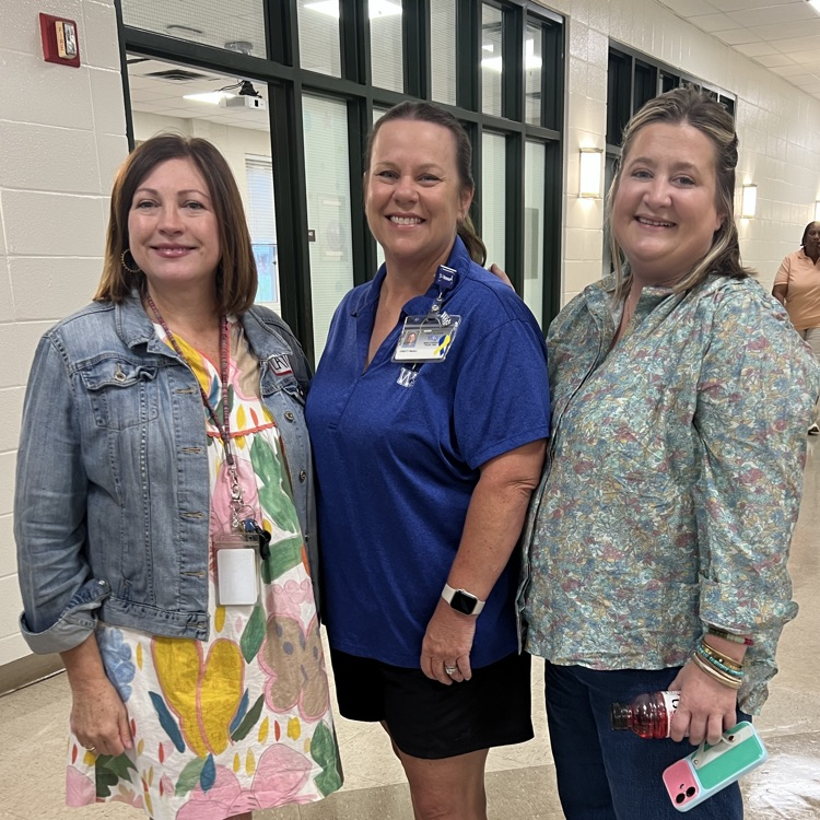 Staff members visit over breakfast