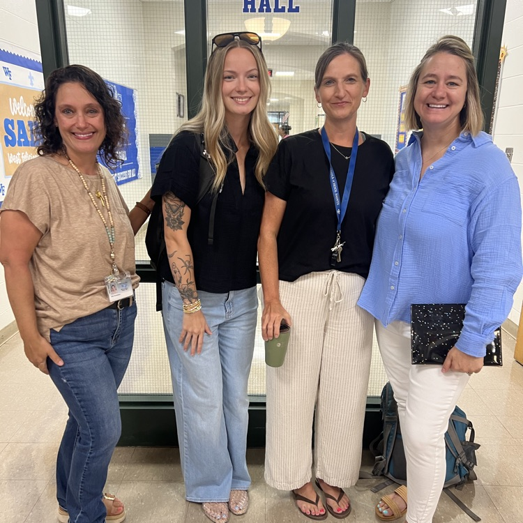Staff members visit over breakfast