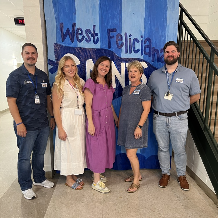Staff members visit over breakfast