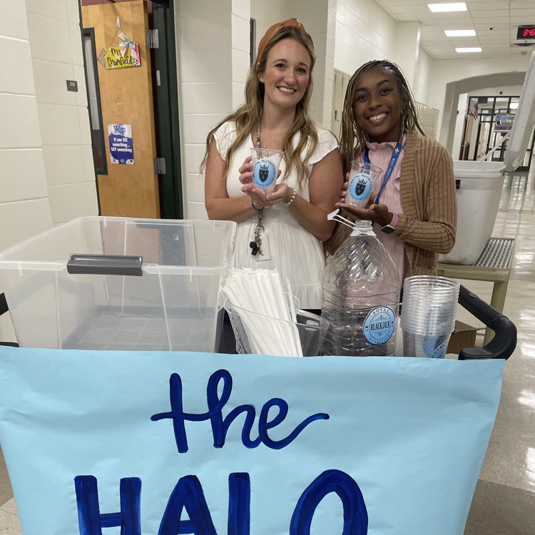 Teachers grab a tea from the halo express cart