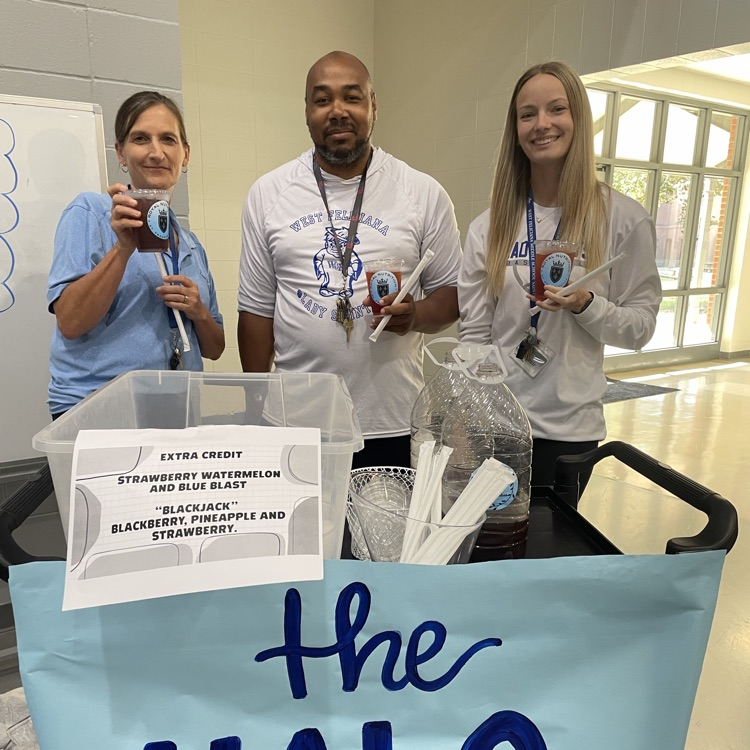 Teachers grab a tea from the halo express cart