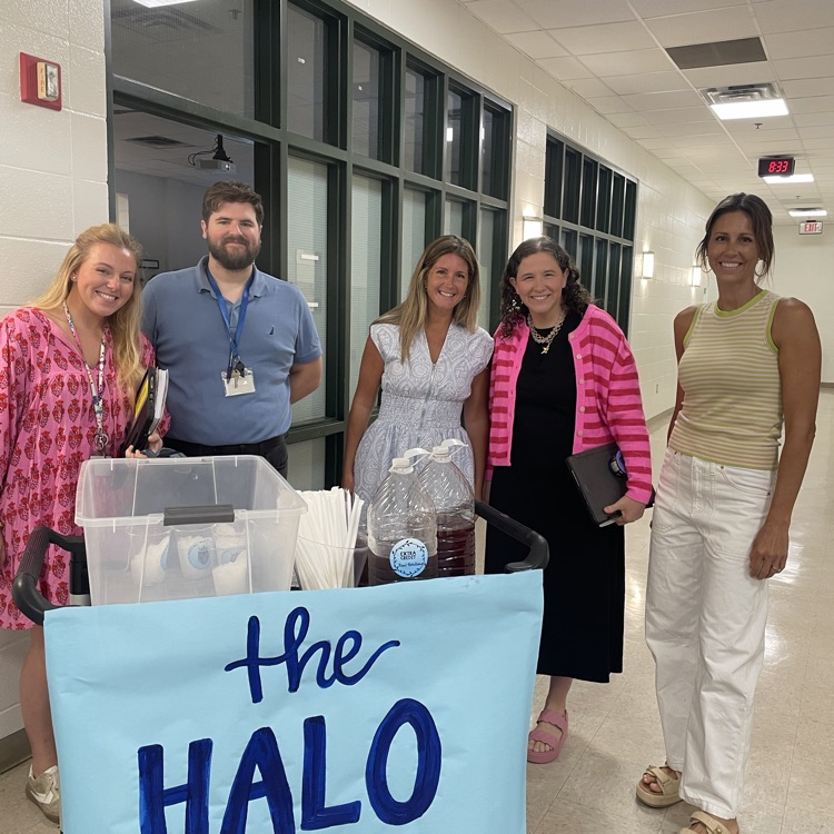 Teachers grab a tea from the halo express cart