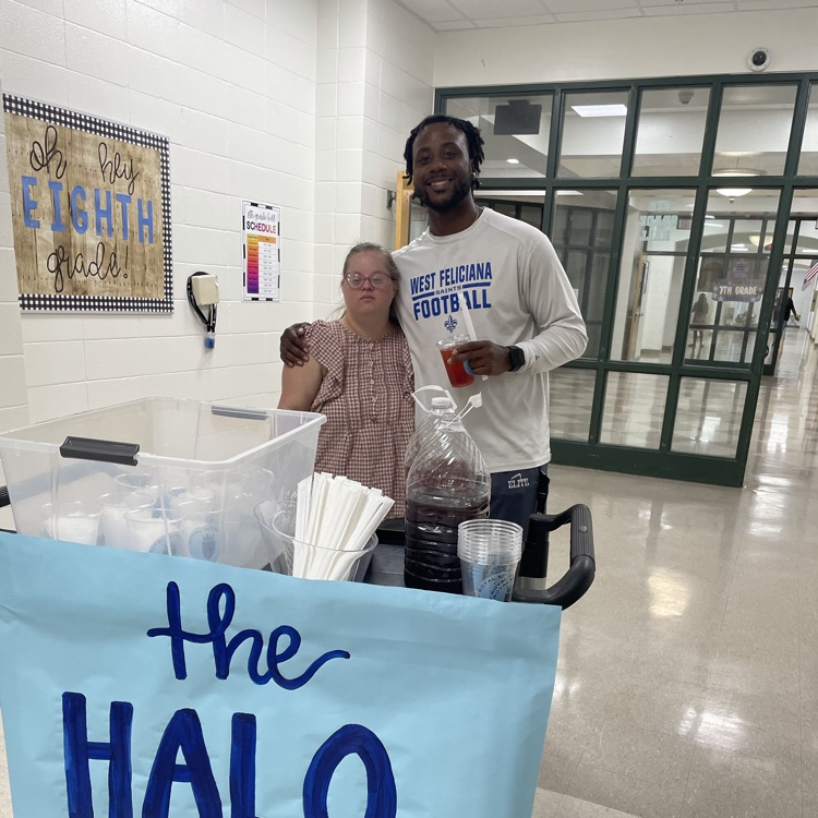 Teachers grab a tea from the halo express cart