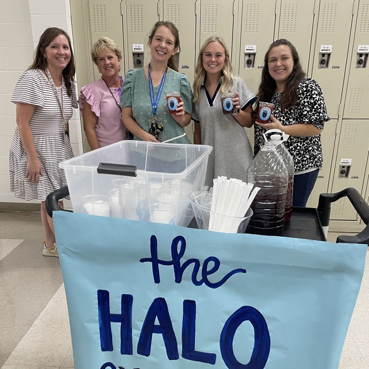 Teachers grab a tea from the halo express cart
