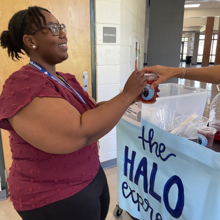 Teachers grab a tea from the halo express cart
