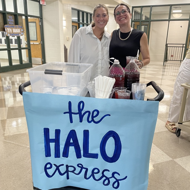 Teachers grab a tea from the halo express cart