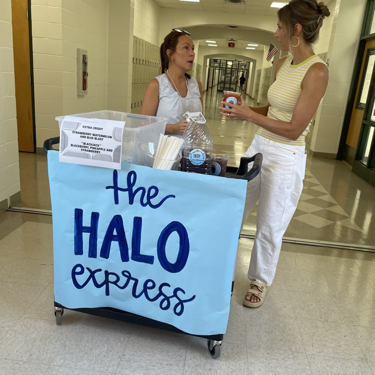 Teachers grab a tea from the halo express cart