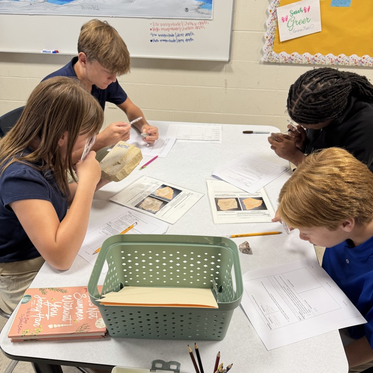 students study properties of rocks