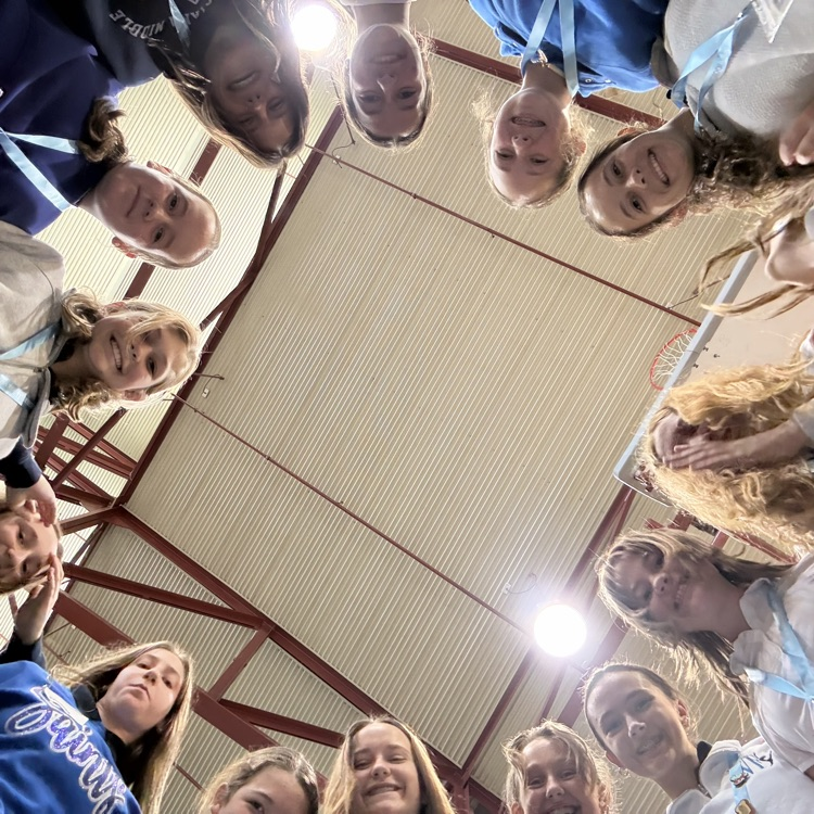 students pictured in a circle