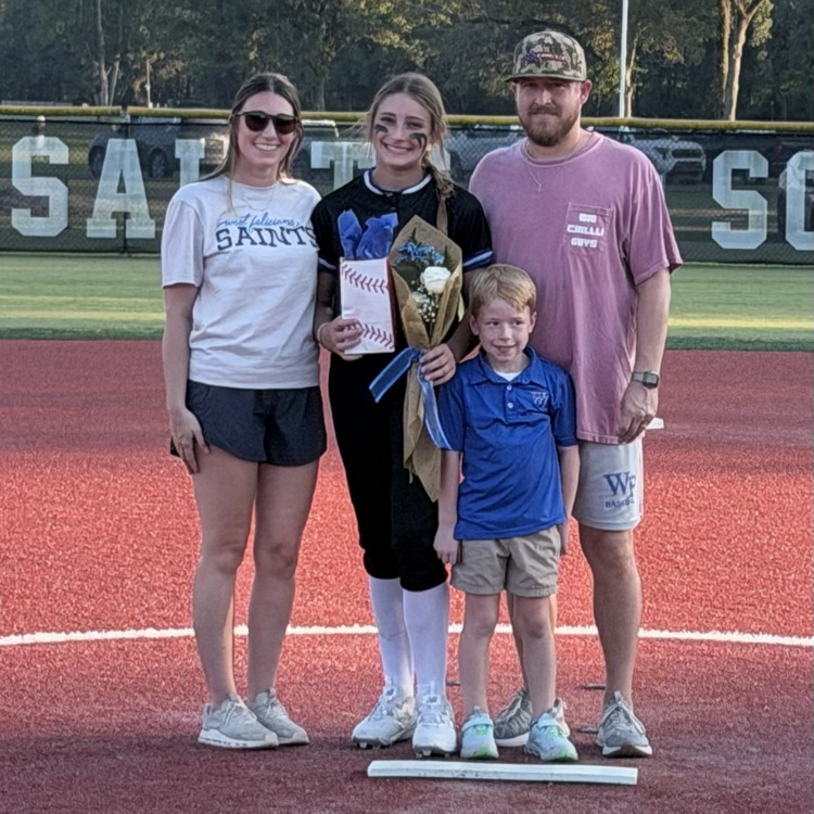 8th grade player poses with parent for last home game 