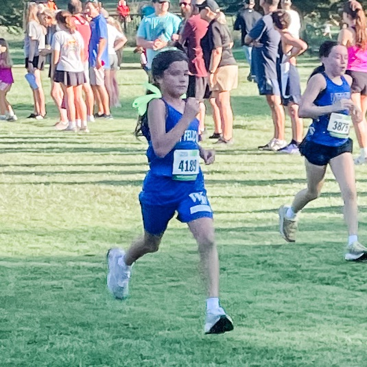 cross country runner featured on a run