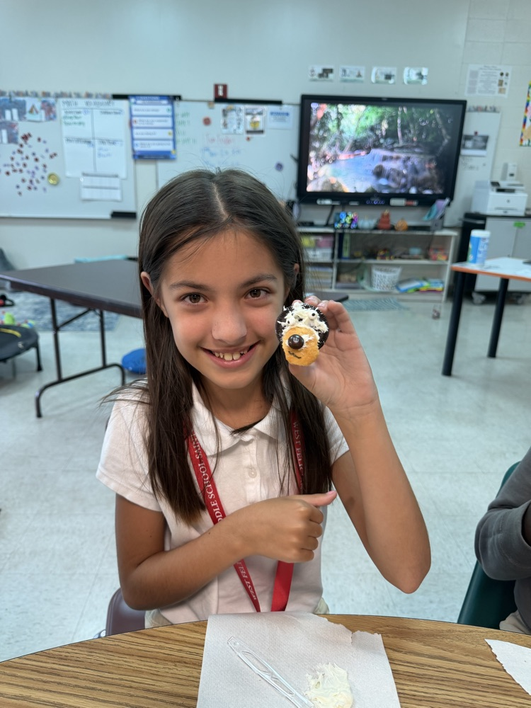 student shows snack