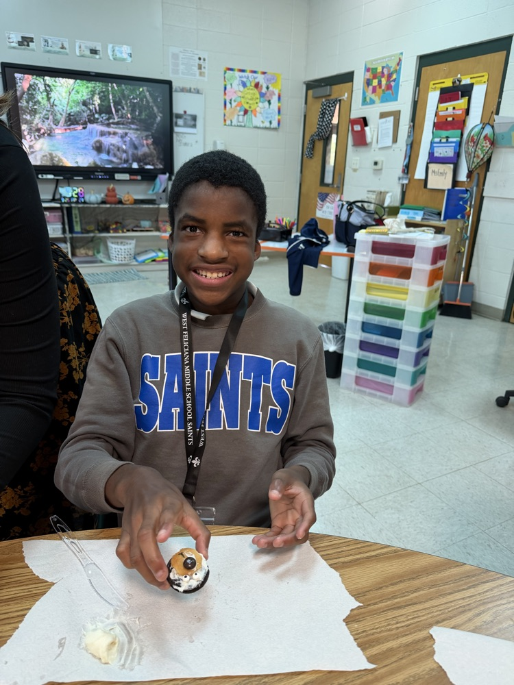 student shows snack